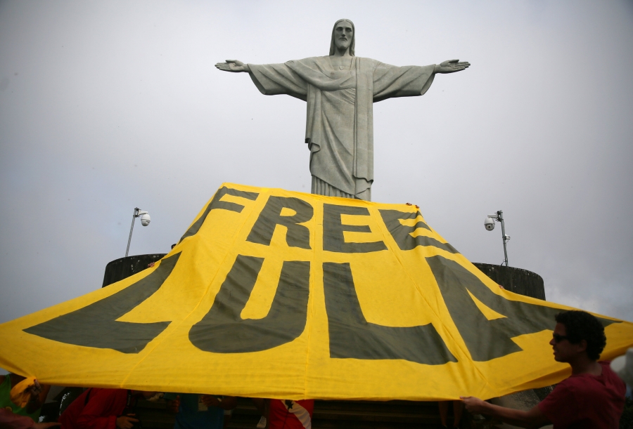 Supporters of former Brazilian President Luiz Inacio Lula da Silva display a banner in front of the statue of Christ the Redeemer in Rio de Janeiro, Brazil, on April 14, 2018. Supporters of former Brazilian President Luiz Inacio Lula da Silva display a yellow banner reading "Free Lula" in front of the statue of Christ the Redeemer in Rio de Janeiro, Brazil, on April 14, 2018.